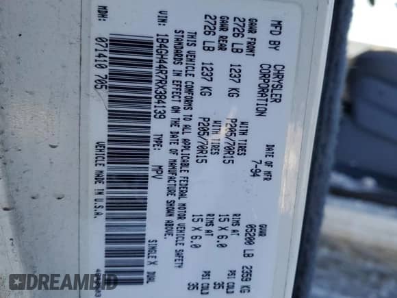 1994 Dodge Caravan Grand SE z VIN 1B4GH44R7RX384139, wystawiony jako Copart lot #87722835 z przebiegiem 173 830 mil mil oraz Szkoda całkowita • Salvage title. Historia ofert i sprzedaży dostępna na DreamBid. Obrazek 16.