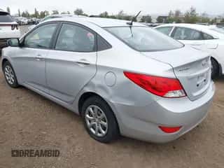 2013 Hyundai Accent GLS z VIN KMHCT4AE4DU529791, wystawiony jako IAAI lot #43308558 z przebiegiem 209 206 mil mil oraz . Historia ofert i sprzedaży dostępna na DreamBid. Obrazek 3.