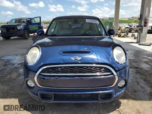 2014 MINI Hardtop S with VIN WMWXM7C52ET986993, listed as a Copart auction lot 61662055 with 99,544 mi miles and Clean title. Bid and sale history available at DreamBid. Image 5.