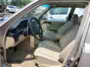 1989 Mercedes-Benz 300 E with VIN WDBEA30D8KA823147, listed as a Copart auction lot 60485455 with 126,614 mi miles and Salvage title. Bid and sale history available at DreamBid. Image 7.