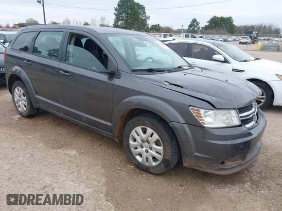 2014 Dodge Journey American Value with VIN 3C4PDCAB7ET247286, listed as a IAAI auction lot 41214056 with 205,222 mi miles and . Bid and sale history available at DreamBid. Image 1.