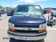 2014 Chevrolet Express Cargo with VIN 1GCWGGFA8E1200169, listed as a IAAI auction lot 42873279 with 95,155 mi miles and . Bid and sale history available at DreamBid. Image 6.