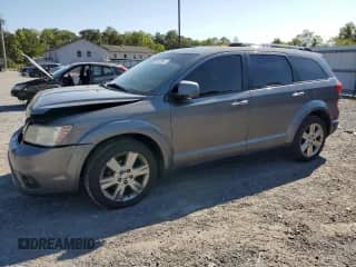 2012 Dodge Journey Crew with VIN 3C4PDDDG9CT152190, listed as a Copart auction lot 80565345 with 143,929 mi miles and Salvage title. Bid and sale history available at DreamBid. Image 1.