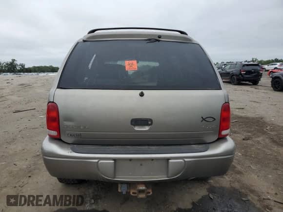 2000 Dodge Durango z VIN 1B4HS28Z3YF297430, wystawiony jako Copart lot #69311225 z przebiegiem 229 826 mil mil oraz Szkoda całkowita • Salvage title. Historia ofert i sprzedaży dostępna na DreamBid. Obrazek 6.