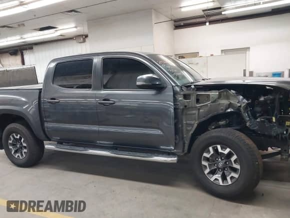 2019 Toyota Tacoma TRD Off Road with VIN 3TMCZ5AN2KM194198, listed as a IAAI auction lot 43463635 with 48,375 mi miles and . Bid and sale history available at DreamBid. Image 14.