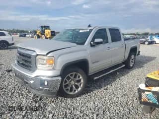 2015 GMC Sierra 1500 SLT with VIN 3GTP1VEC1FG154930, listed as a Copart auction lot 71824795 with 159,781 mi miles and Salvage title. Bid and sale history available at DreamBid. Image 1.