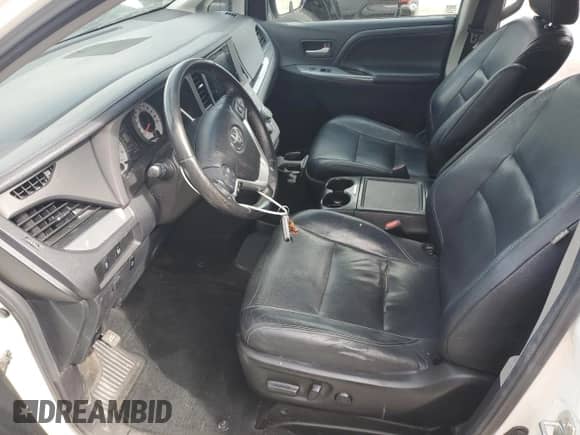 2015 Toyota Sienna SE with VIN 5TDXK3DC8FS656354, listed as a Copart auction lot 86177875 with 192,471 mi miles and Salvage title. Bid and sale history available at DreamBid. Image 7.