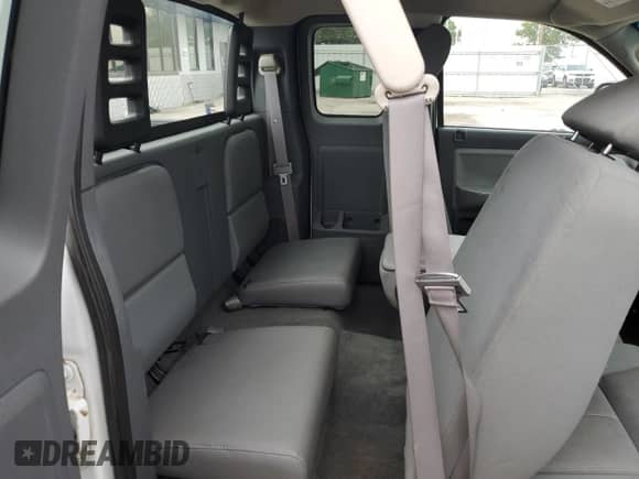 2005 Dodge Dakota SLT с VIN 1D7HE42N75S290422, выставлен на аукционе Copart как лот 59613155 с пробегом 132 450 миль миль и Списание • Salvage title. История ставок и продаж доступна на DreamBid. Изображение 10.