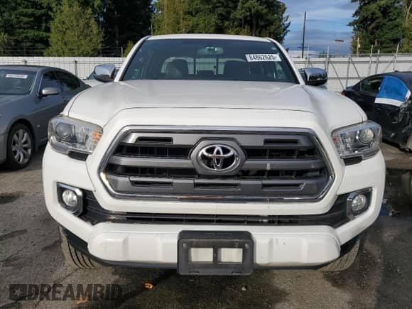 2016 Toyota Tacoma Limited z VIN 3TMGZ5AN5GM025799, wystawiony jako Copart lot #84862625 z przebiegiem 56 984 mil mil oraz Czysty tytuł • Clean title. Historia ofert i sprzedaży dostępna na DreamBid. Obrazek 5.