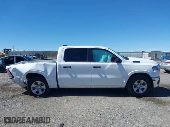 2025 Ram 1500 Big Horn with VIN 1C6RRFFG9SN509893, listed as a IAAI auction lot 41817619 with 1,808 mi miles and . Bid and sale history available at DreamBid. Image 13.
