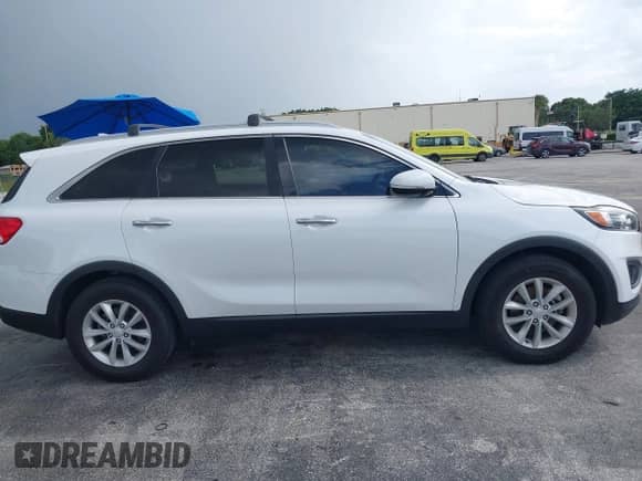 2016 Kia Sorento L with VIN 5XYPG4A39GG091994, listed as a IAAI auction lot 43068521 with 114,776 mi miles and . Bid and sale history available at DreamBid. Image 13.
