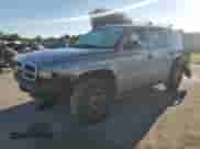 2001 Dodge Durango with VIN 1B4HS28N41F640765, listed as a Copart auction lot 82454665 with 294,694 mi miles and Salvage title. Bid and sale history available at DreamBid. Image 1.