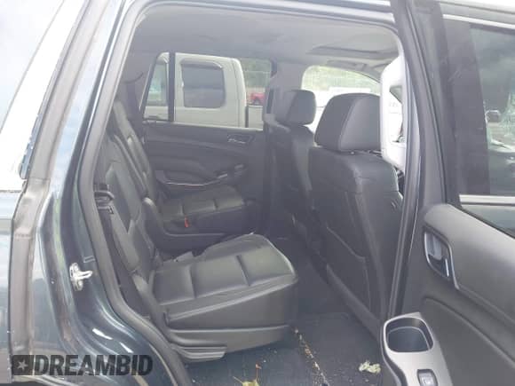 2019 Chevrolet Tahoe LT with VIN 1GNSKBKC7KR180041, listed as a IAAI auction lot 43191387 with 84,538 mi miles and . Bid and sale history available at DreamBid. Image 8.