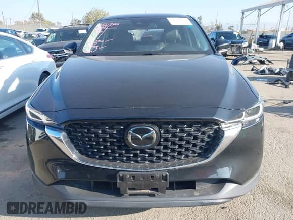 2022 Mazda CX-5 S Select z VIN JM3KFBBMXN0624955, wystawiony jako IAAI lot #43335876 z przebiegiem 77 689 mil mil oraz . Historia ofert i sprzedaży dostępna na DreamBid. Obrazek 12.