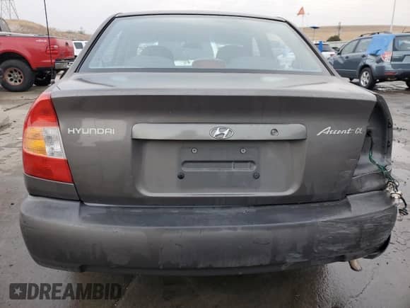 2002 Hyundai Accent GL z VIN KMHCG45C72U269610, wystawiony jako Copart lot #80362953 z przebiegiem 89 481 mil mil oraz Szkoda całkowita • Salvage title. Historia ofert i sprzedaży dostępna na DreamBid. Obrazek 6.