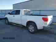 2012 Toyota Tundra z VIN 5TFRU5F1XCX027582, wystawiony jako Copart lot #85649634 z przebiegiem 267 030 mil mil oraz Szkoda całkowita • Salvage title. Historia ofert i sprzedaży dostępna na DreamBid. Obrazek 2.