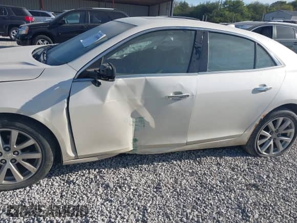 2014 Chevrolet Malibu LTZ with VIN 1G11H5SL4EF155987, listed as a IAAI auction lot 43360908 with 181,331 mi miles and . Bid and sale history available at DreamBid. Image 6.