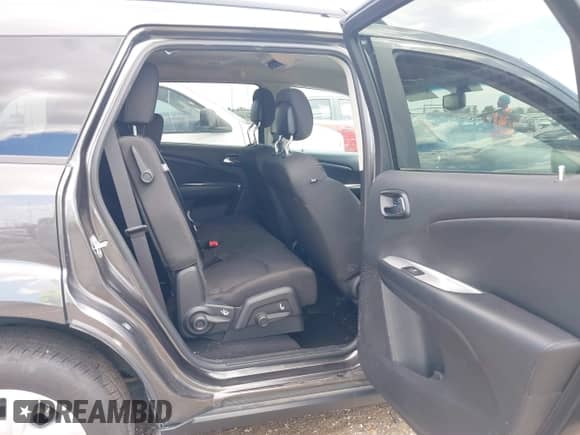 2017 Dodge Journey SE with VIN 3C4PDCAB9HT538957, listed as a IAAI auction lot 43303219 with 68,636 mi miles and . Bid and sale history available at DreamBid. Image 8.