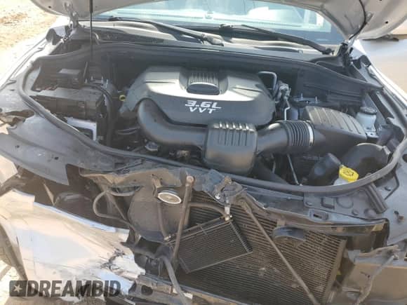 2013 Dodge Durango SXT with VIN 1C4RDJAG0DC527750, listed as a Copart auction lot 67166485 with 47,974 mi miles and Salvage title. Bid and sale history available at DreamBid. Image 12.