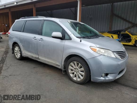 2012 Toyota Sienna XLE with VIN 5TDDK3DC0CS045345, listed as a Copart auction lot 60988205 with 210,182 mi miles and Clean title. Bid and sale history available at DreamBid. Image 4.