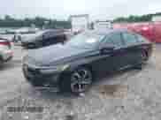 2018 Honda Accord Sport z VIN 1HGCV2F34JA004707, wystawiony jako IAAI lot #42973792 z przebiegiem 94 709 mil mil oraz . Historia ofert i sprzedaży dostępna na DreamBid. Obrazek 2.