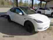 2021 Tesla Model Y Long Range with VIN 5YJYGDEE6MF138868, listed as a IAAI auction lot 43401839 with 134,786 mi miles and . Bid and sale history available at DreamBid. Image 1.
