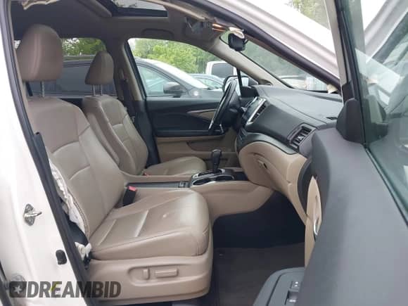 2016 Honda Pilot EX-L with VIN 5FNYF6H63GB072979, listed as a IAAI auction lot 42297910 with 155,869 mi miles and . Bid and sale history available at DreamBid. Image 5.