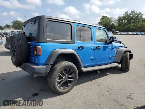 2023 Jeep Wrangler Sport S with VIN 1C4HJXDG7PW677814, listed as a Copart auction lot 67802085 with 28,546 mi miles and Salvage title. Bid and sale history available at DreamBid. Image 3.