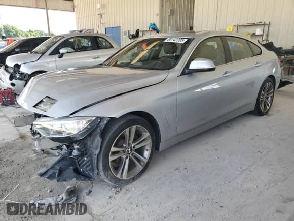 2016 BMW 4 Series 428i with VIN WBA4A9C52GG507393, listed as a Copart auction lot 80142205 with Not provided miles and Salvage title. Bid and sale history available at DreamBid. Image 1.
