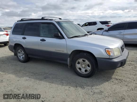2002 Subaru Forester L with VIN JF1SF63522G747391, listed as a Copart auction lot 72027955 with 248,177 mi miles and Clean title. Bid and sale history available at DreamBid. Image 4.