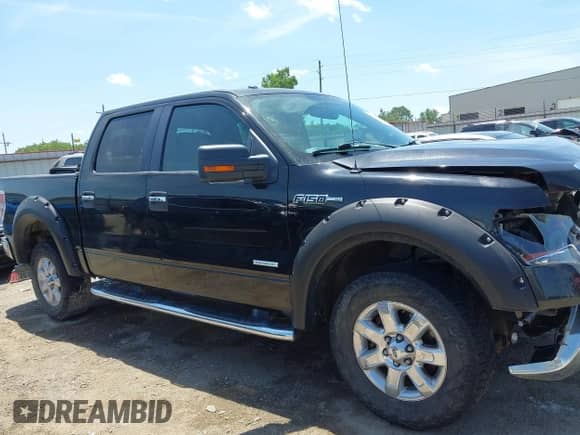 2013 Ford F-150 Lariat with VIN 1FTFW1ET9DKE25809, listed as a IAAI auction lot 42531919 with 247,445 mi miles and . Bid and sale history available at DreamBid. Image 14.