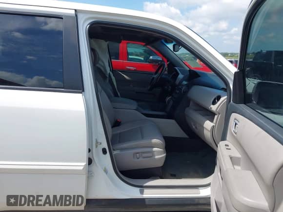 2014 Honda Pilot EX-L z VIN 5FNYF4H55EB010556, wystawiony jako IAAI lot #43027449 z przebiegiem 114 365 mil mil oraz . Historia ofert i sprzedaży dostępna na DreamBid. Obrazek 5.