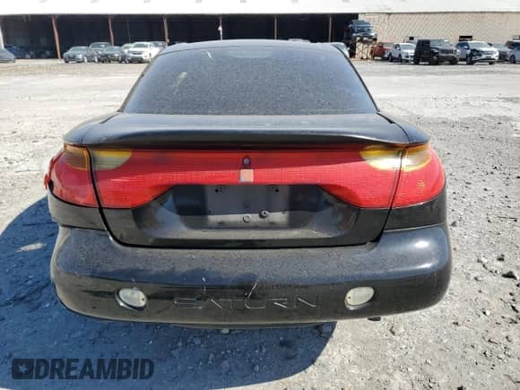 2001 Saturn SC с VIN 1G8ZR12701Z223174, выставлен на аукционе Copart как лот 52033445 с пробегом 234 079 миль миль и Списание • Salvage title. История ставок и продаж доступна на DreamBid. Изображение 6.