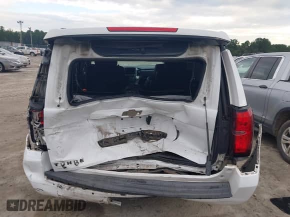 2015 Chevrolet Tahoe LT with VIN 1GNSCBKC6FR181443, listed as a IAAI auction lot 43099107 with 234,716 mi miles and . Bid and sale history available at DreamBid. Image 6.