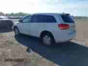 2015 Dodge Journey American Value z VIN 3C4PDCAB4FT720305, wystawiony jako IAAI lot #43284296 z przebiegiem 197 779 mil mil oraz . Historia ofert i sprzedaży dostępna na DreamBid. Obrazek 3.