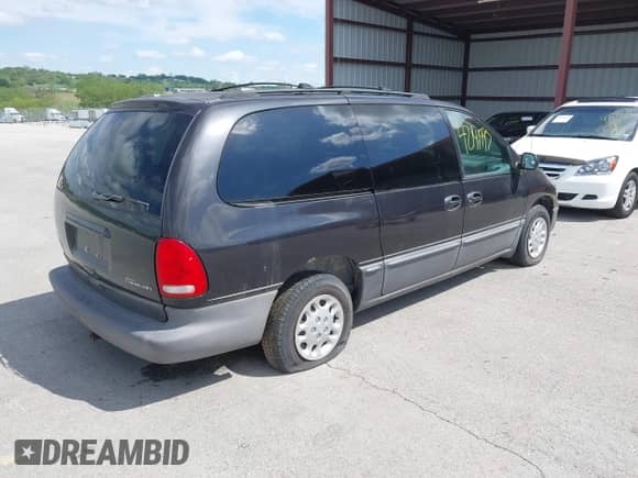 1999 Dodge Grand Caravan with VIN 1B4GP54GXXB897614, listed as a IAAI auction lot 42141997 with 157,698 mi miles and . Bid and sale history available at DreamBid. Image 4.