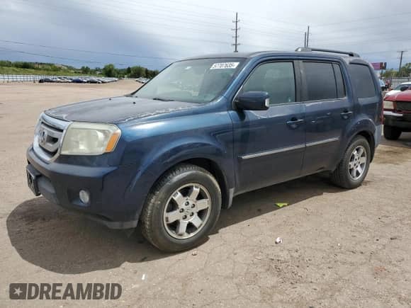 2009 Honda Pilot Touring with VIN 5FNYF48939B049607, listed as a Copart auction lot 57707635 with 243,702 mi miles and Non repairable. Bid and sale history available at DreamBid. Image 1.