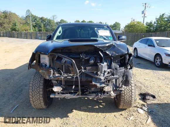2020 Toyota Tacoma SR5 with VIN 3TMCZ5AN0LM331088, listed as a IAAI auction lot 43270787 with 69,590 mi miles and . Bid and sale history available at DreamBid. Image 13.