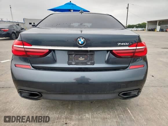 2017 BMW 7 Series 740i с VIN WBA7E2C34HG740975, выставлен на аукционе Copart как лот 71019405 с пробегом 90 805 миль миль и Списание • Salvage title. История ставок и продаж доступна на DreamBid. Изображение 6.