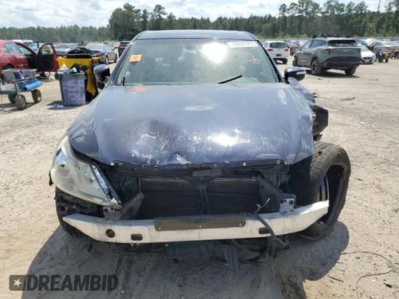 2013 Hyundai Genesis 3.8L with VIN KMHGC4DD9DU235761, listed as a Copart auction lot 70937185 with Not provided miles and Salvage title. Bid and sale history available at DreamBid. Image 5.