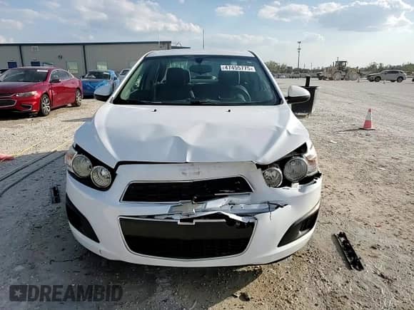 2015 Chevrolet Sonic LS with VIN 1G1JB5SH8F4159907, listed as a Copart auction lot 47455775 with 87,397 mi miles and Salvage title. Bid and sale history available at DreamBid. Image 13.