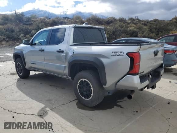 2024 Toyota Tacoma TRD Off Road with VIN 3TMLB5JN6RM029446, listed as a Copart auction lot 86650705 with 27,292 mi miles and Clean title. Bid and sale history available at DreamBid. Image 2.
