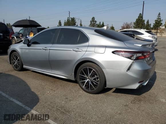 2023 Toyota Camry Hybrid SE with VIN 4T1G31AK6PU618210, listed as a Copart auction lot 64641305 with 21,685 mi miles and Salvage title. Bid and sale history available at DreamBid. Image 2.