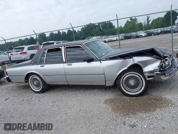 1986 Chevrolet Caprice с VIN 1G1BN69H5GY139096, выставлен на аукционе IAAI как лот 42658175 с пробегом 124 000 миль миль и . История ставок и продаж доступна на DreamBid. Изображение 13.