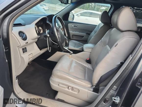 2009 Honda Pilot Touring with VIN 5FNYF38829B016406, listed as a Copart auction lot 71791575 with 221,923 mi miles and Salvage title. Bid and sale history available at DreamBid. Image 7.