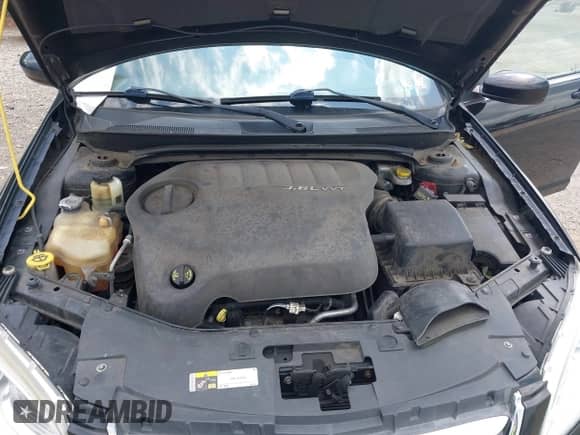 2014 Chrysler 200 LX с VIN 1C3CCBAG0EN101291, выставлен на аукционе IAAI как лот 42798818 с пробегом 102 028 миль миль и . История ставок и продаж доступна на DreamBid. Изображение 10.