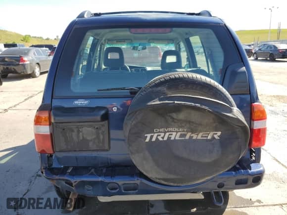 2002 Chevrolet Tracker with VIN 2CNBE13C926933455, listed as a Copart auction lot 58235764 with 189,629 mi miles and Salvage title. Bid and sale history available at DreamBid. Image 6.