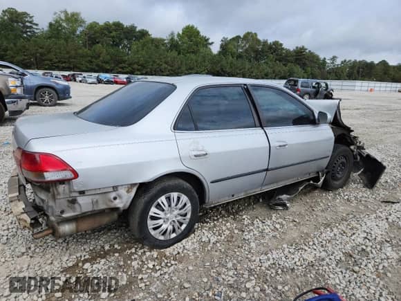 2000 Honda Accord LX with VIN 1HGCG6653YA154885, listed as a Copart auction lot 83931995 with 211,277 mi miles and Salvage title. Bid and sale history available at DreamBid. Image 3.
