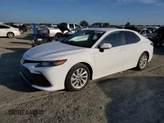 2022 Toyota Camry LE с VIN 4T1C11AK8NU658404, выставлен на аукционе Copart как лот 89670435 с пробегом 30 986 миль миль и Списание • Salvage title. История ставок и продаж доступна на DreamBid. Изображение 1.
