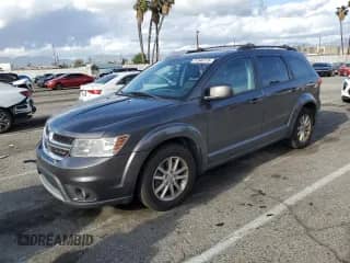 2014 Dodge Journey SXT z VIN 3C4PDCCB3ET126462, wystawiony jako Copart lot #51544175 z przebiegiem 156 011 mil mil oraz Czysty tytuł • Clean title. Historia ofert i sprzedaży dostępna na DreamBid. Obrazek 1.